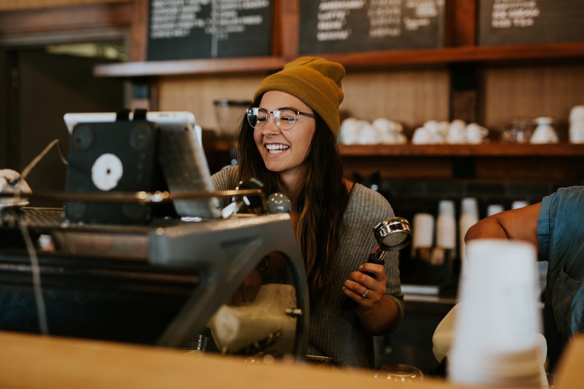 smiling female in coffeeshop